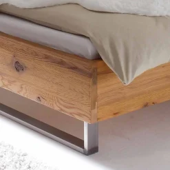 Wildholz Bett Housten mit Bügelgestell aus Metall